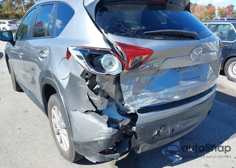 2015 Mazda Cx-5 Touring z USA, uszkodzony, nr VIN JM3KE2CY7F0528142